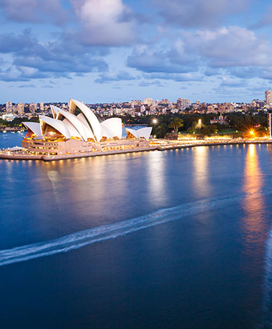 Sydney skin rejuvenation model with curly red hair and blue eyes