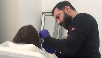 Sydney Plastic surgeon Dr. Rizk performing a Rhinoplasty